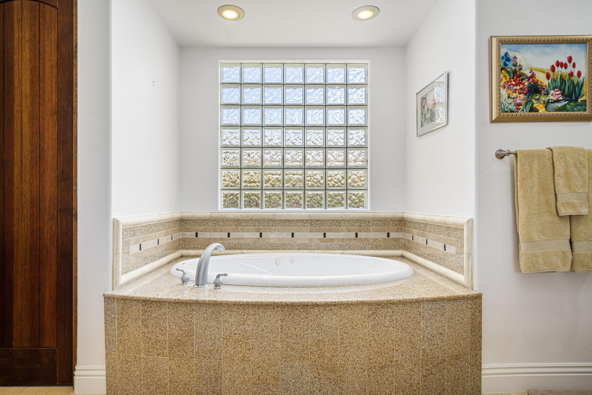 56985 Village Drive La Quinta, CA 92253 - Photo 35 of 73 a white bath tub sitting next to a window