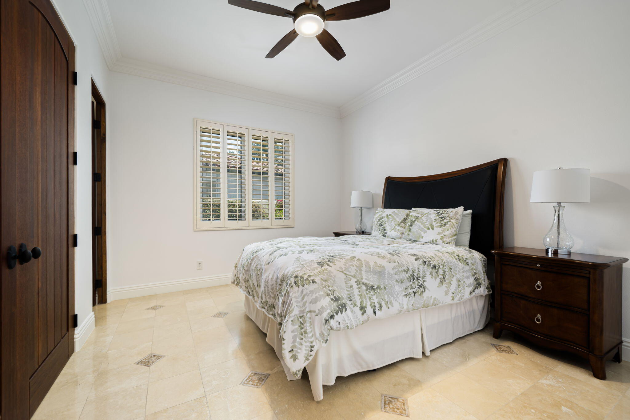 56985 Village Drive La Quinta, CA 92253 - Photo 39 of 73 a bedroom with a bed and window