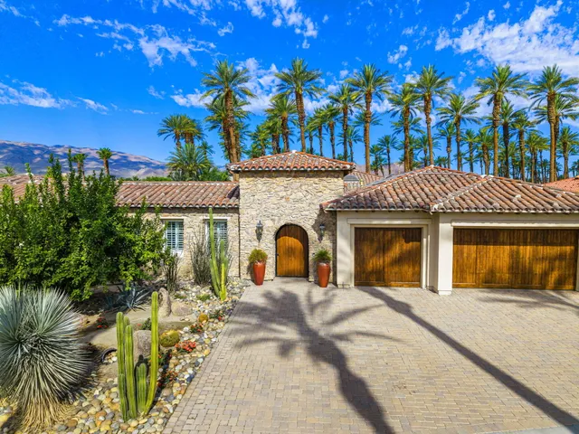 a kitchen with a sink cabinets and stainless steel appliances