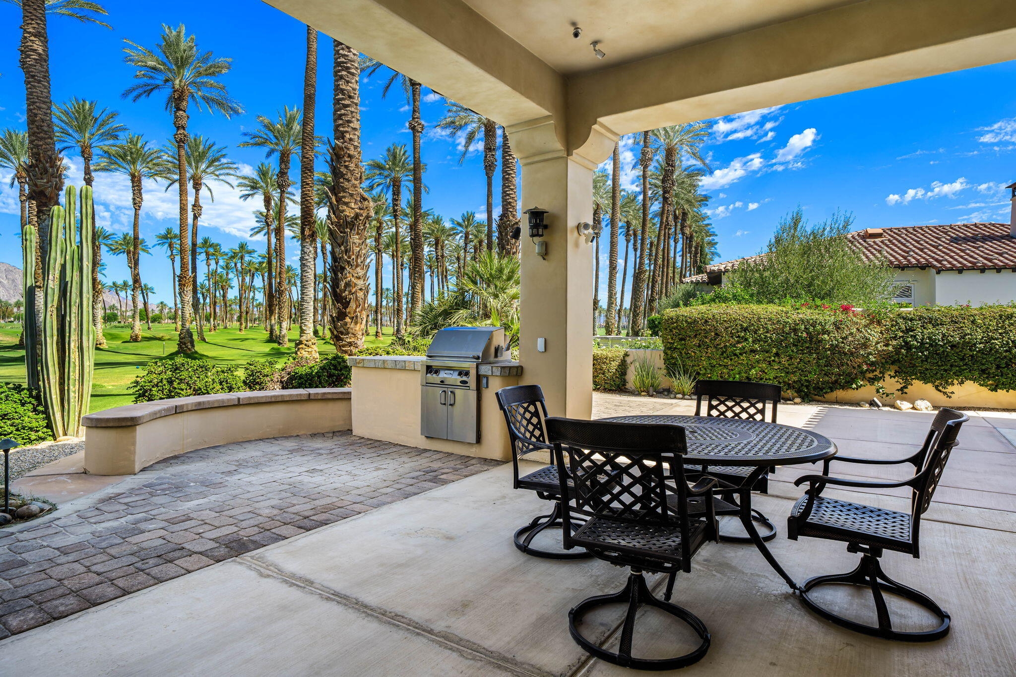 56985 Village Drive La Quinta, CA 92253 - Photo 67 of 73 a view of a chairs and tables in the patio