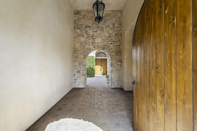 a kitchen with a sink cabinets and window