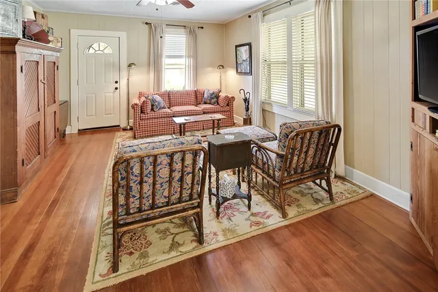 a living room with furniture and a window