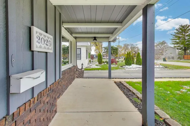 a house with garden in front of it