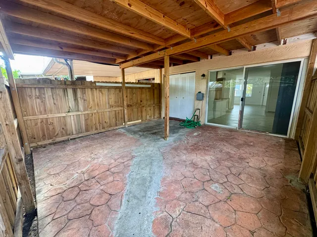 a view of backyard with green space