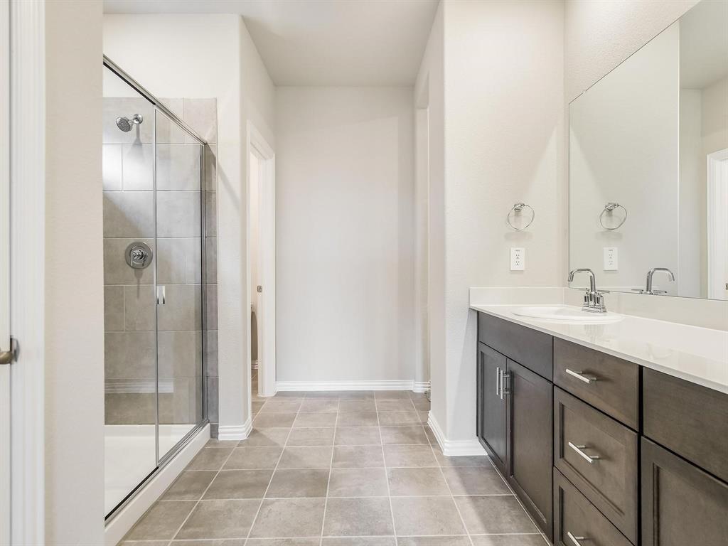 2256 Bellatrix Drive Haslet, TX 76052 - Photo 12 of 24 a spacious bathroom with a shower and a sink