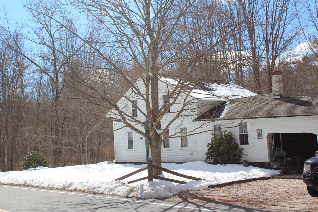 280 Somers Road Hampden, MA 01036 - Photo 3 of 30 a street view with wooden fence