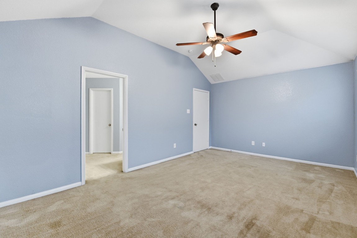 16763 North Blue Jay Drive Conroe, TX 77385 - Photo 15 of 26 a view of room with window and ceiling fan