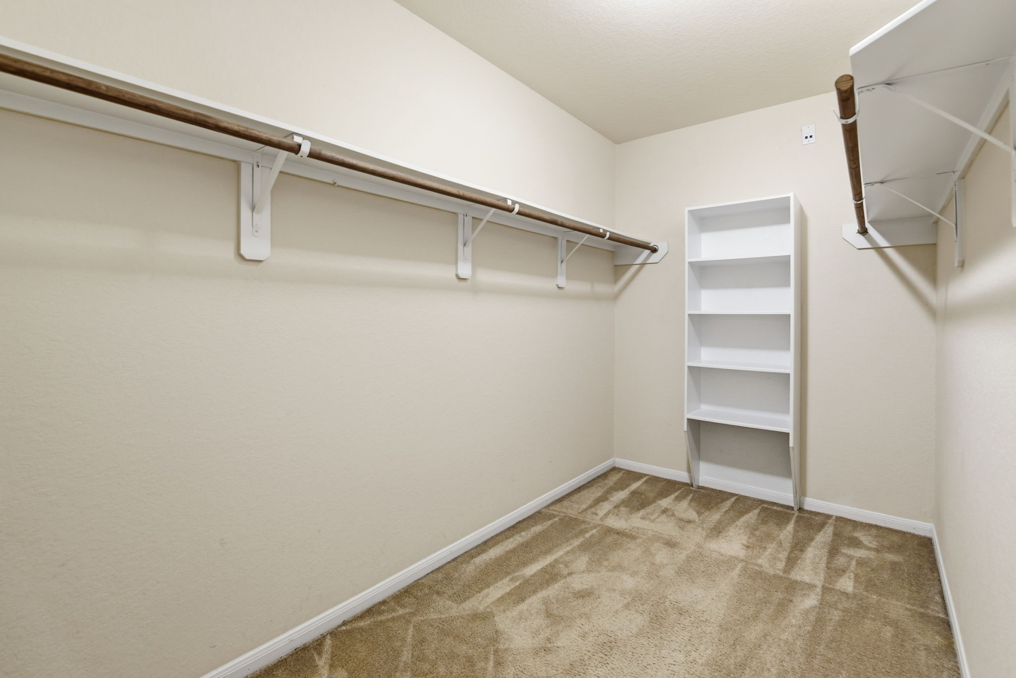16763 North Blue Jay Drive Conroe, TX 77385 - Photo 18 of 26 a view of an empty walk in closet