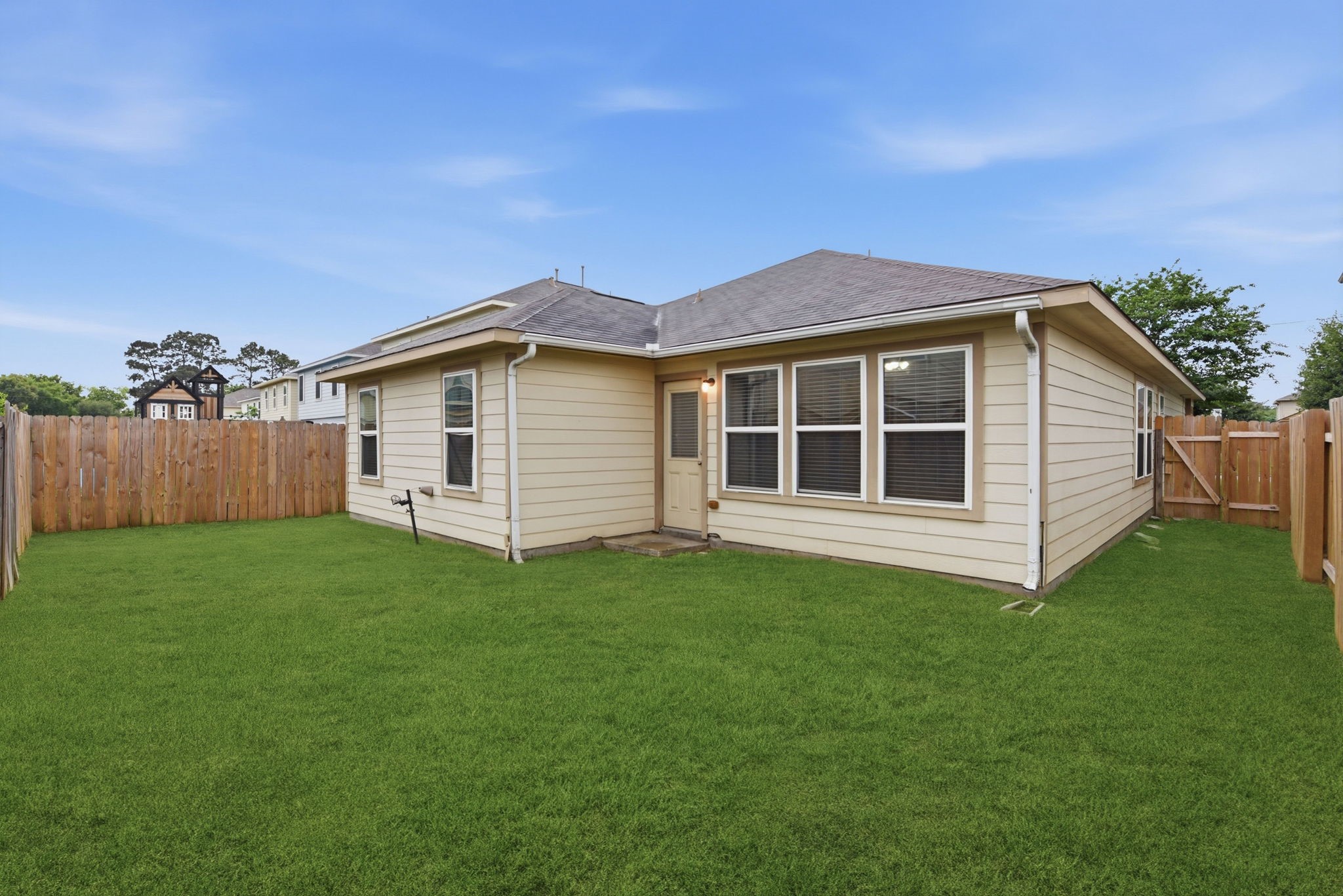 16763 North Blue Jay Drive Conroe, TX 77385 - Photo 26 of 26 a view of a house with a backyard