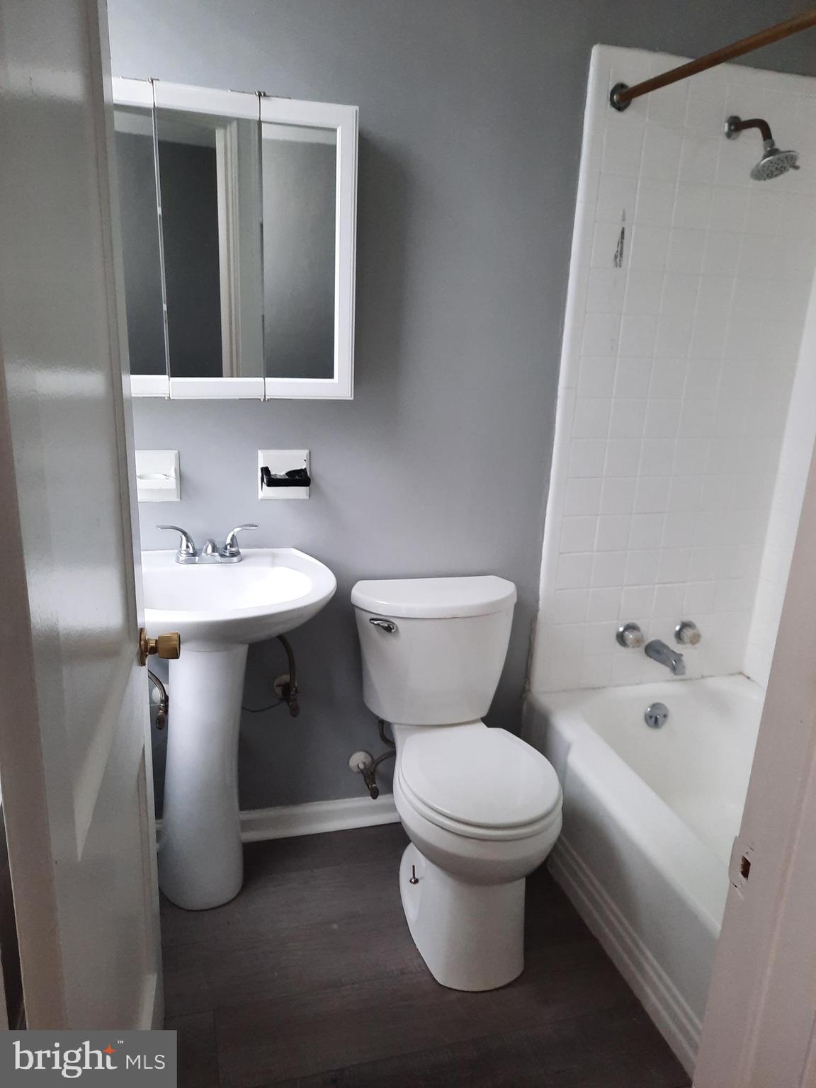 12 South Filbert Street, Unit B6 Mechanicsburg, PA 17055 - Photo 4 of 5 a bathroom with a sink toilet and shower