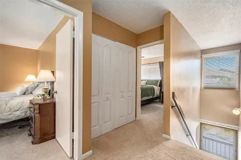 a en suite bathroom with a sink and a mirror