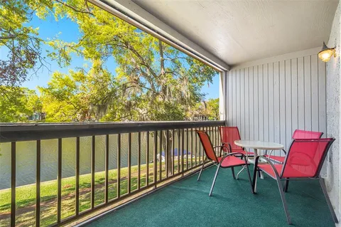 a view of two chairs in the room