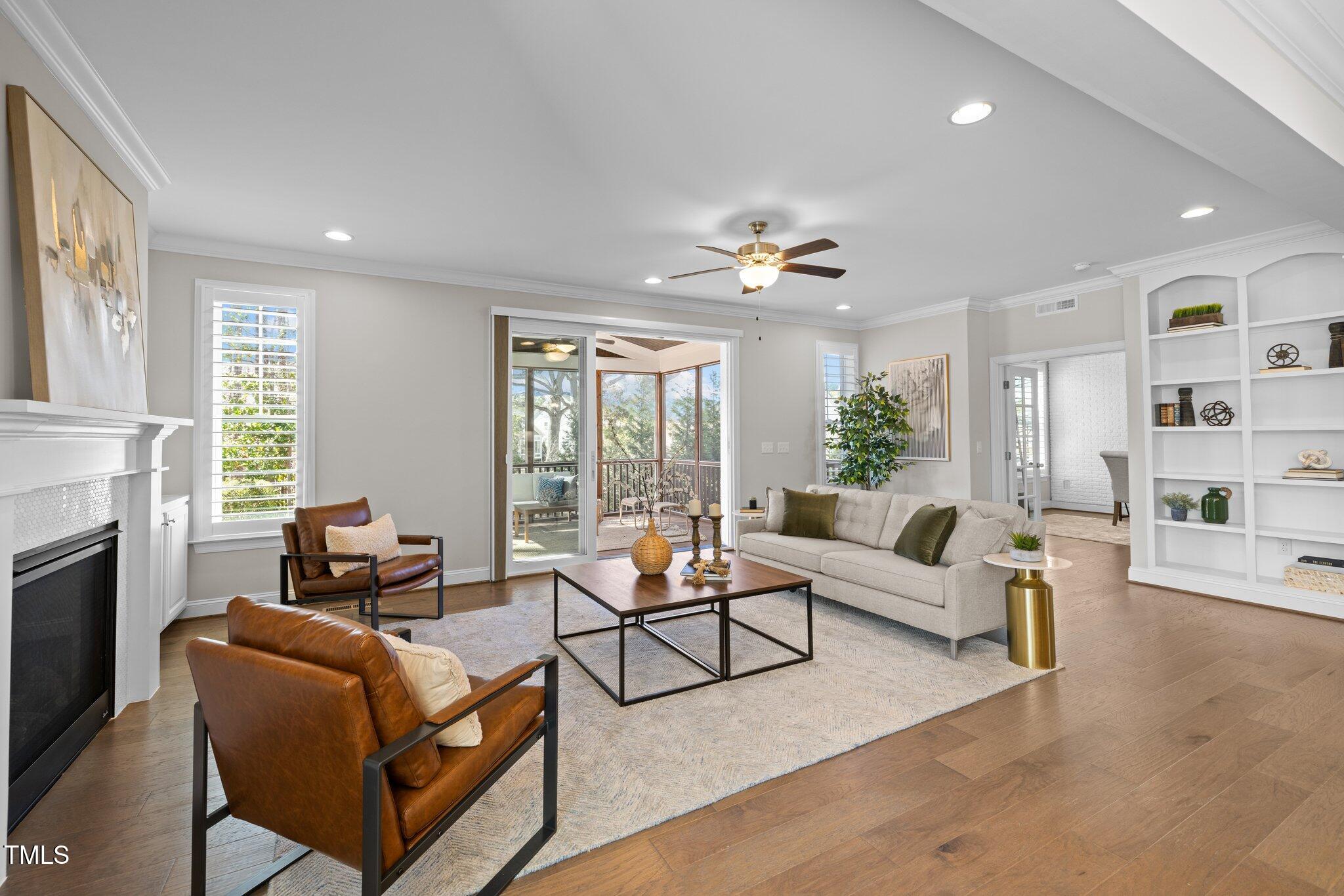 1013 Manchaca Loop Apex, NC 27539 - Photo 17 of 50 a living room with furniture and fireplace