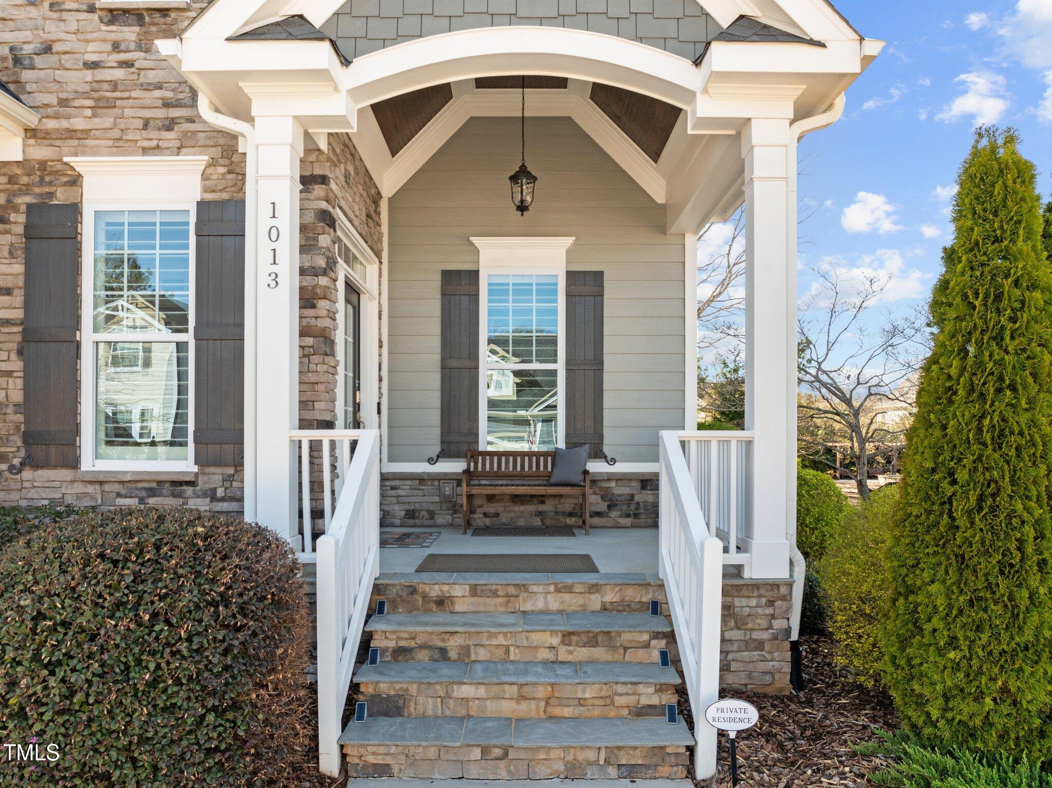 1013 Manchaca Loop Apex, NC 27539 - Photo 2 of 50 a front view of a house with a yard