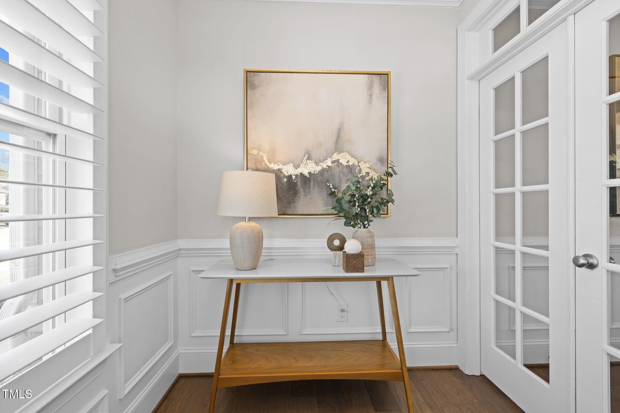 1013 Manchaca Loop Apex, NC 27539 - Photo 4 of 50 a room with a table and a potted plant