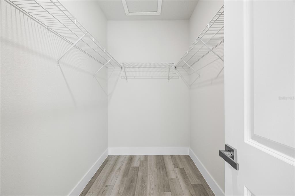 16054 Southwest 29th Court Road Ocala, FL 34473 - Photo 15 of 27 a view of a room with racks on the wall