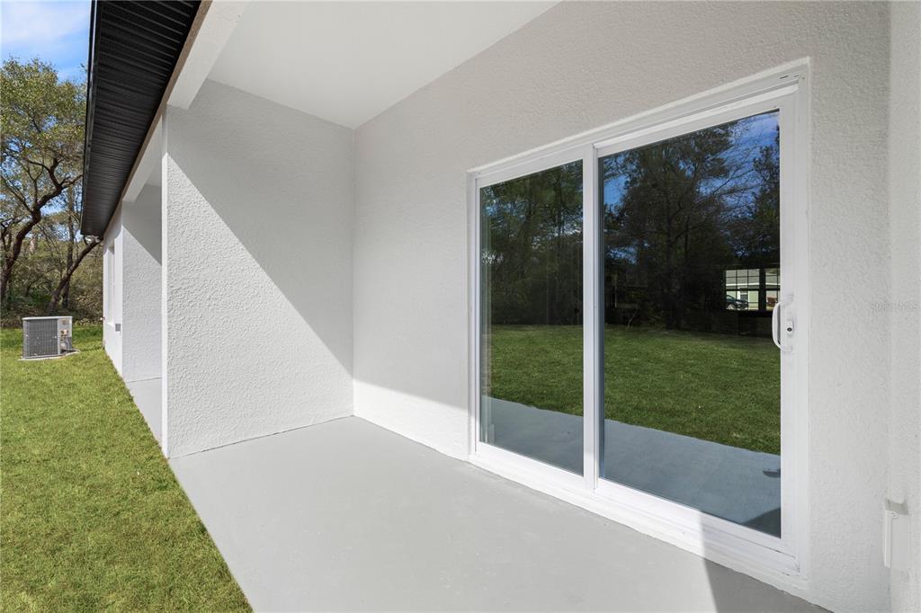 16054 Southwest 29th Court Road Ocala, FL 34473 - Photo 27 of 27 a view of a big room with balcony