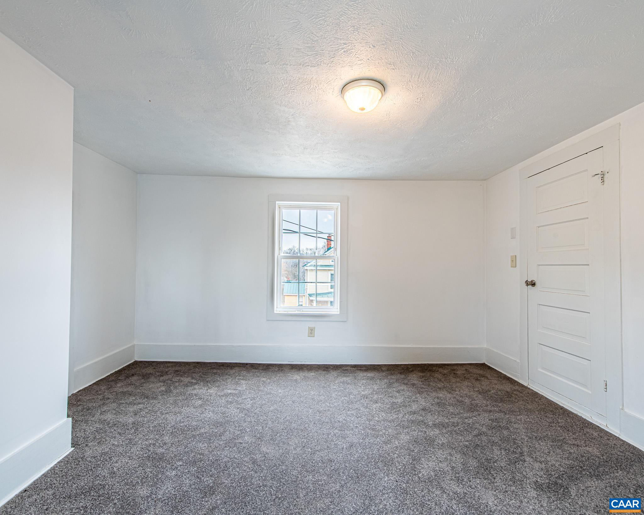 67 Lentz Lane Shipman, VA 22971 - Photo 17 of 31 an empty room with a window