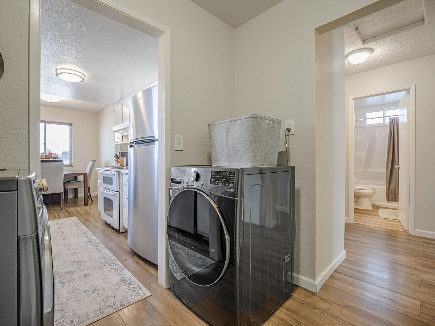 569 Cedar Drive Watsonville, CA 95076 - Photo 13 of 30 a view of a hallway with washer and dryer