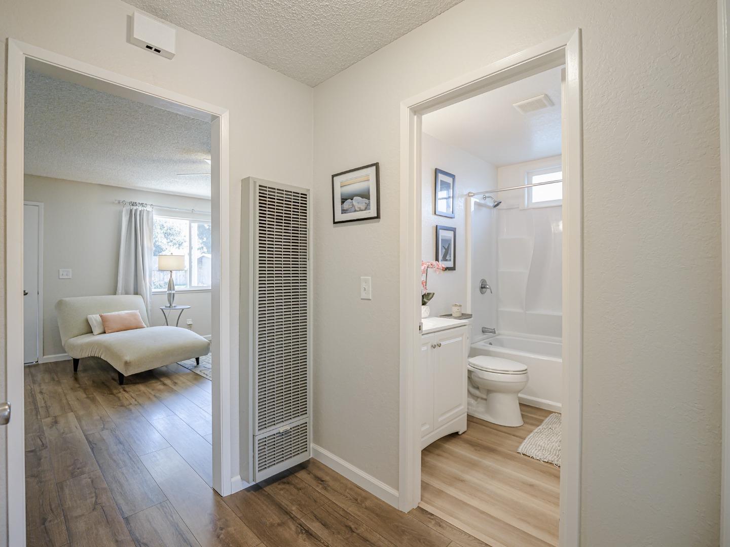 569 Cedar Drive Watsonville, CA 95076 - Photo 14 of 30 a bathroom with a toilet sink and shower