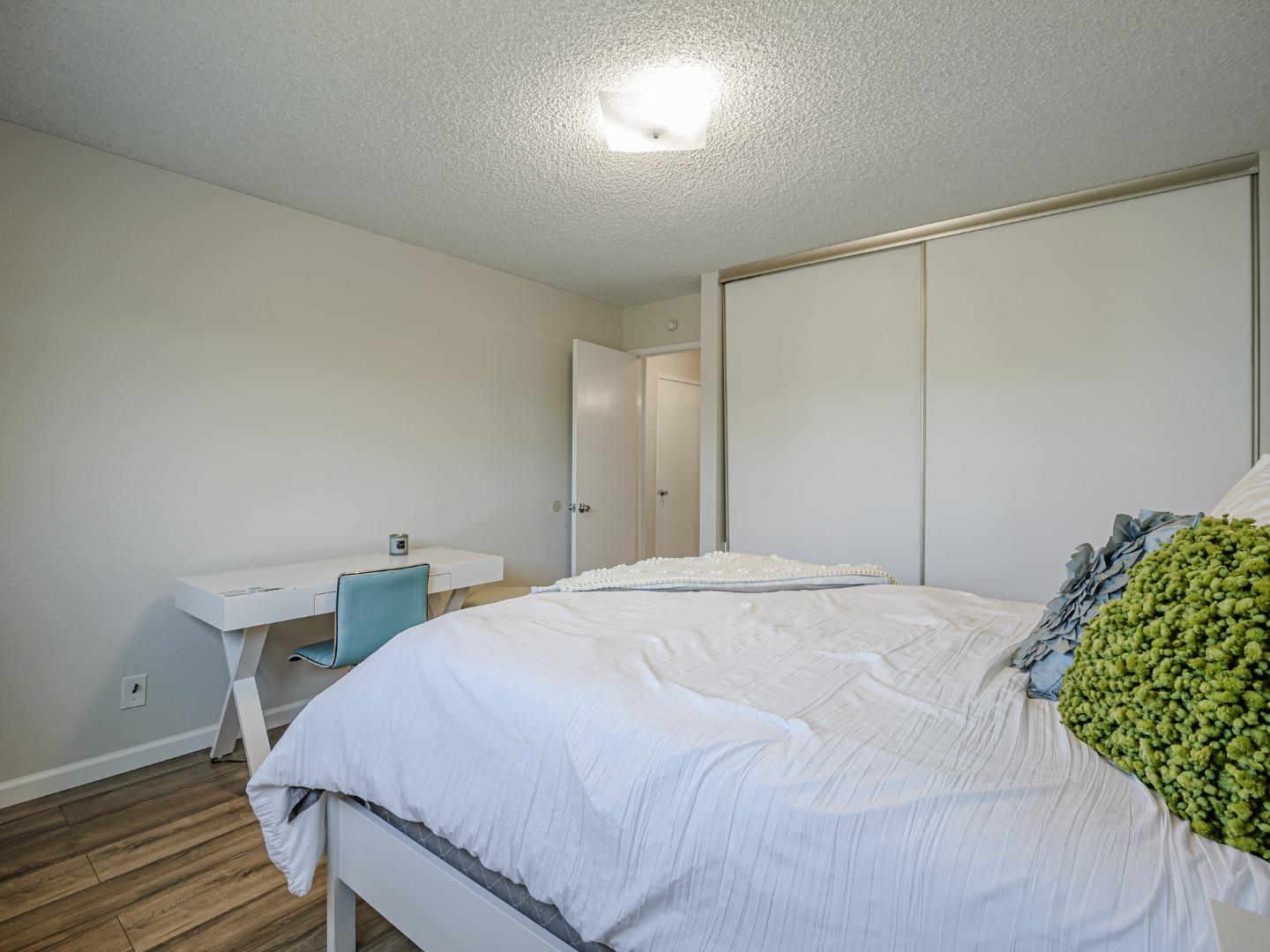 569 Cedar Drive Watsonville, CA 95076 - Photo 16 of 30 a bedroom with a bed and a table