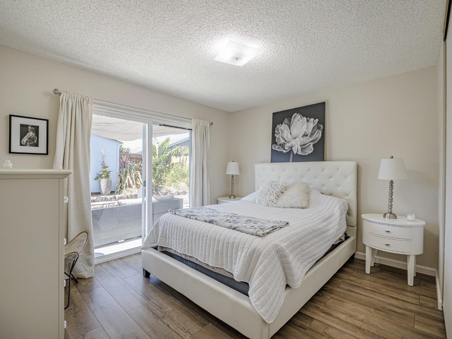 569 Cedar Drive Watsonville, CA 95076 - Photo 18 of 30 a bedroom with a large bed and a window