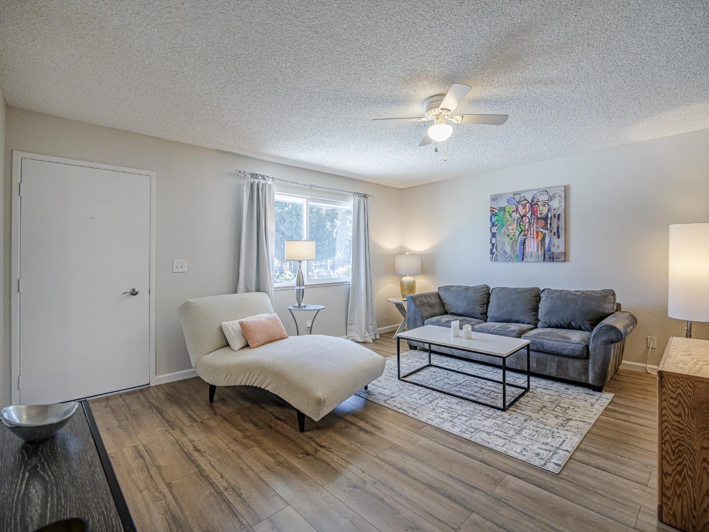 569 Cedar Drive Watsonville, CA 95076 - Photo 5 of 30 a living room with furniture and a wooden floor