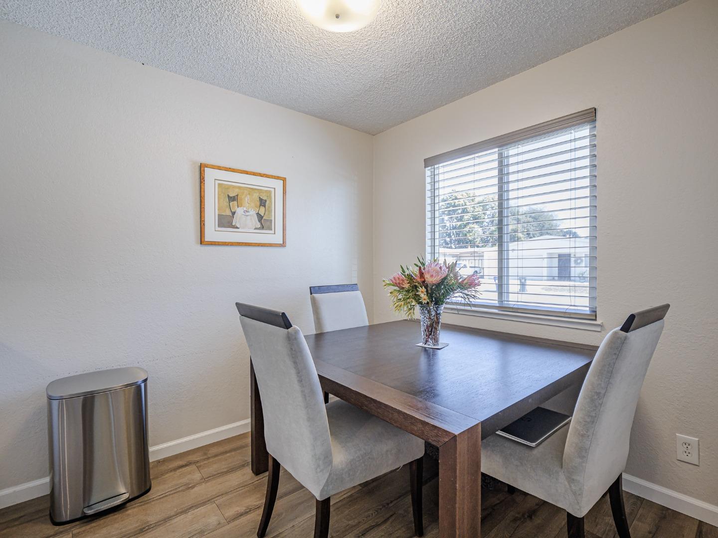 569 Cedar Drive Watsonville, CA 95076 - Photo 7 of 30 a view of a dining room with a table and chairs