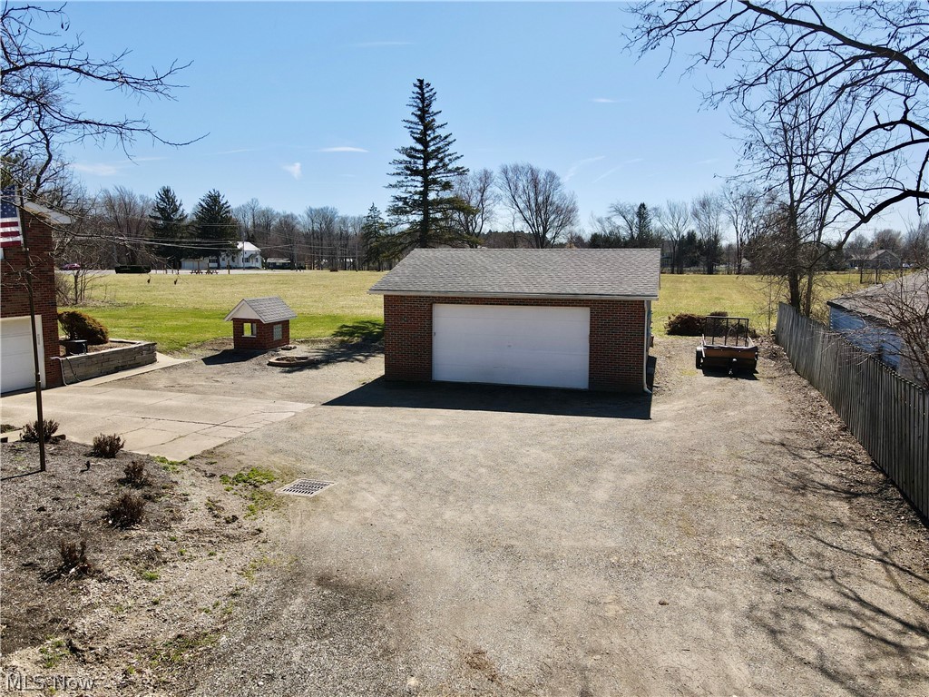 6904 Center Road Valley City, OH 44280 - Photo 35 of 36 Detached garage featuring driveway