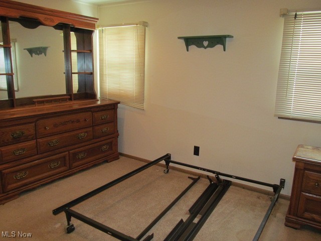 9735 Chillicothe Road, Unit 2 Willoughby, OH 44094 - Photo 27 of 49 Bedroom featuring baseboards