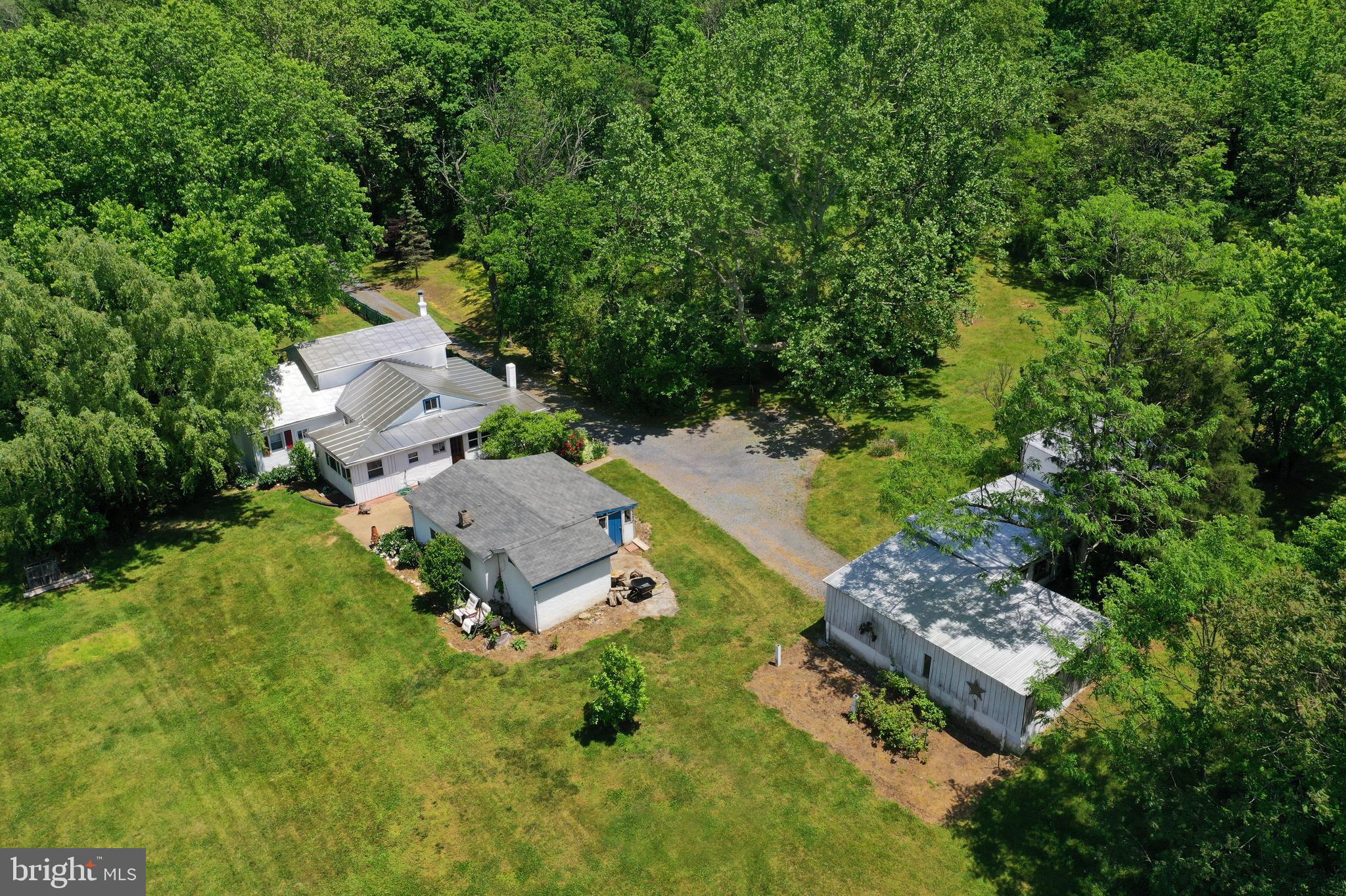 House and outbuildings from air
