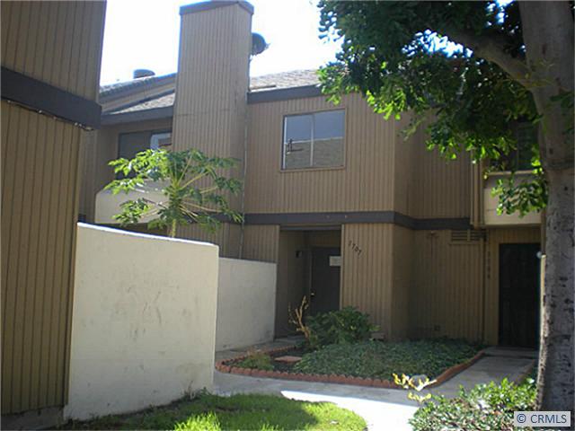 1391 South Walnut Street, Unit 1707 Anaheim, CA 92802 - Photo 1 of 1 a backyard of a house