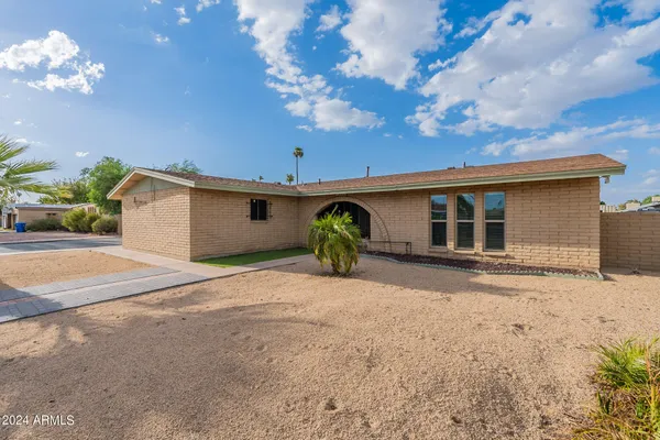 a view of a house with a patio