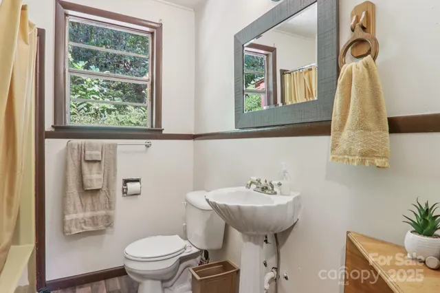 a bathroom with a sink and a toilet