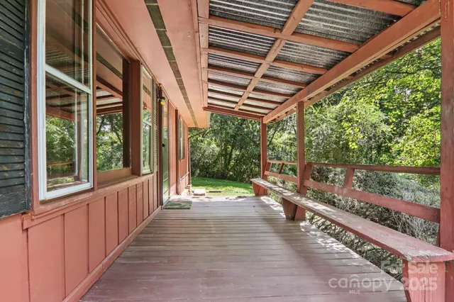 a view of a porch and garden