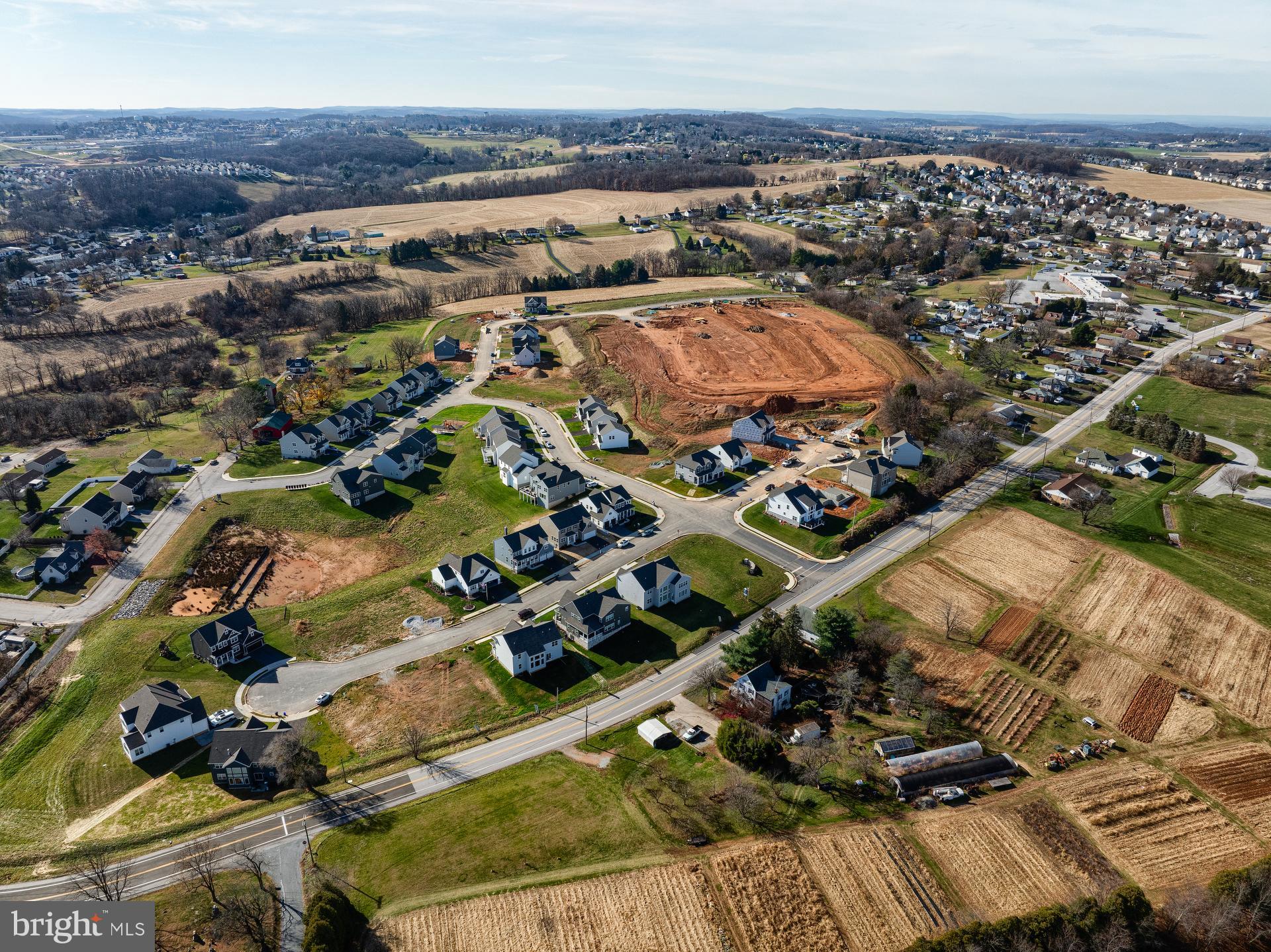 100 Schoolhouse Lane, Unit ADDISON Windsor, PA 17366 - Photo 18 of 20 an aerial view of residential houses with outdoor space