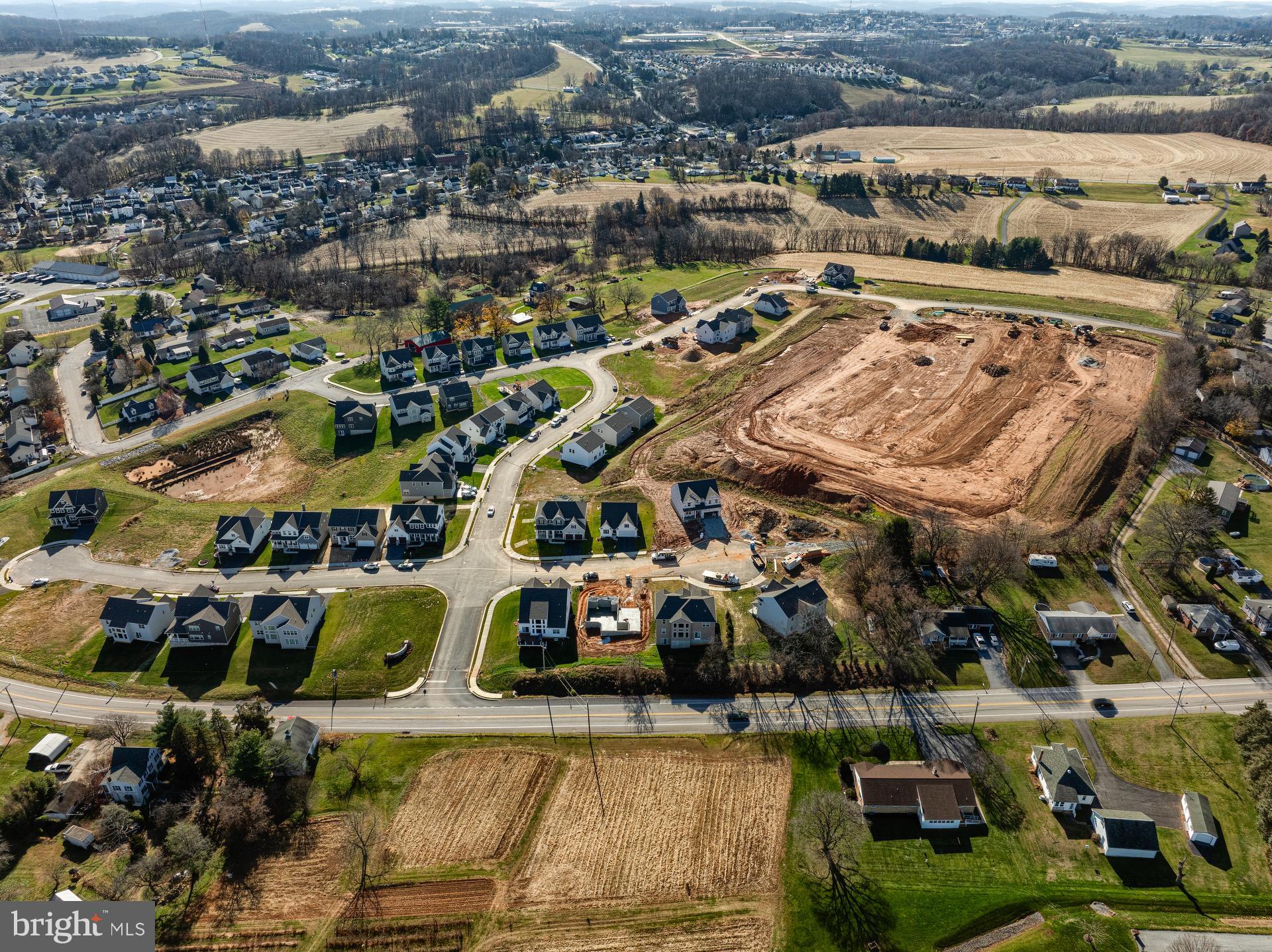 100 Schoolhouse Lane, Unit ADDISON Windsor, PA 17366 - Photo 20 of 20 an aerial view of a building with outdoor space