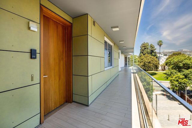 a view of a building and a street