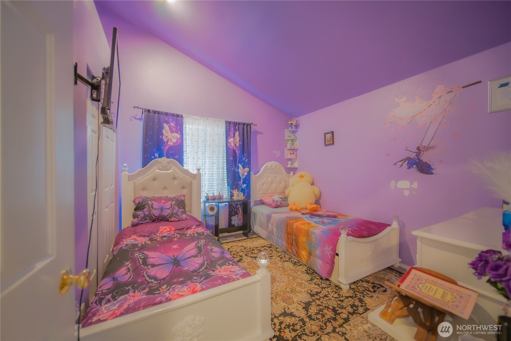 5615 South 233rd Street Kent, WA 98032 - Photo 14 of 24 a bed room with a bed and a window