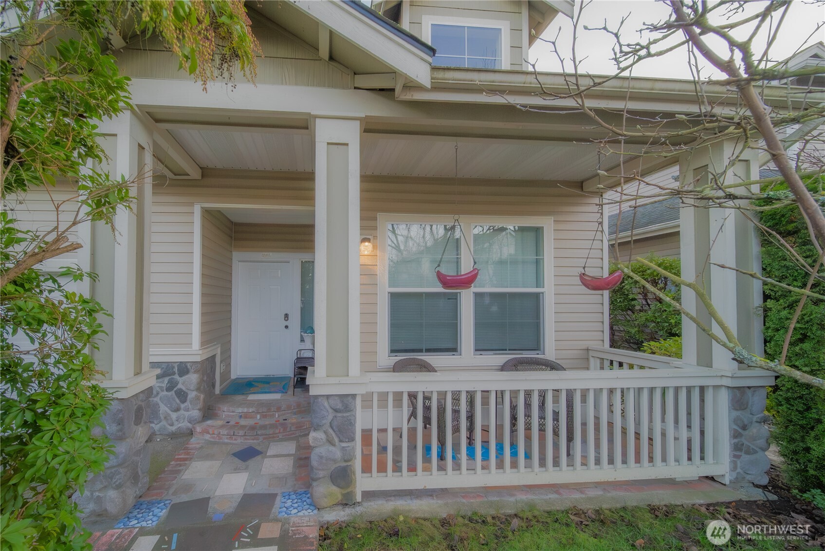 5615 South 233rd Street Kent, WA 98032 - Photo 2 of 24 a front view of a house with a porch