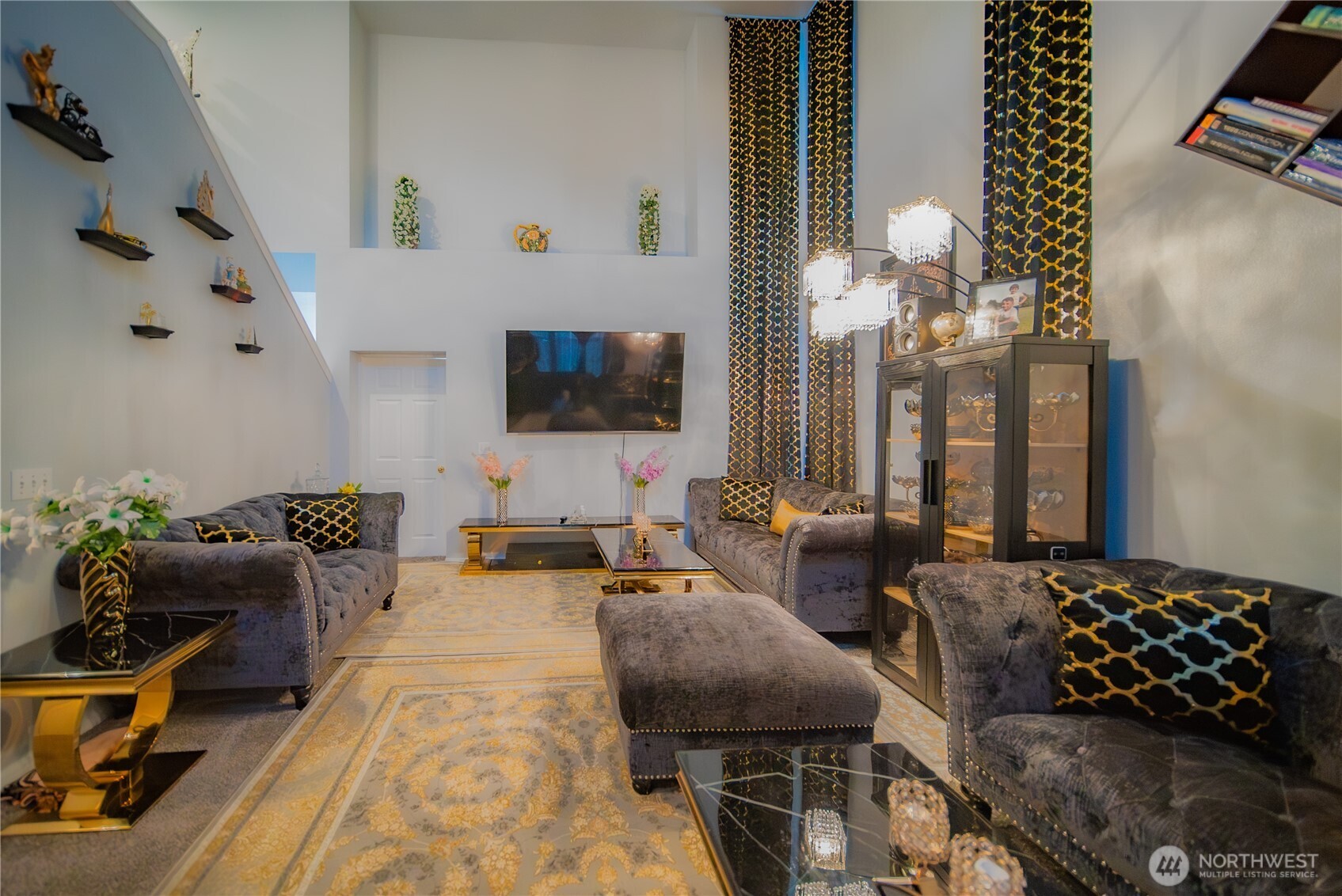 5615 South 233rd Street Kent, WA 98032 - Photo 3 of 24 a living room with furniture and a flat screen tv