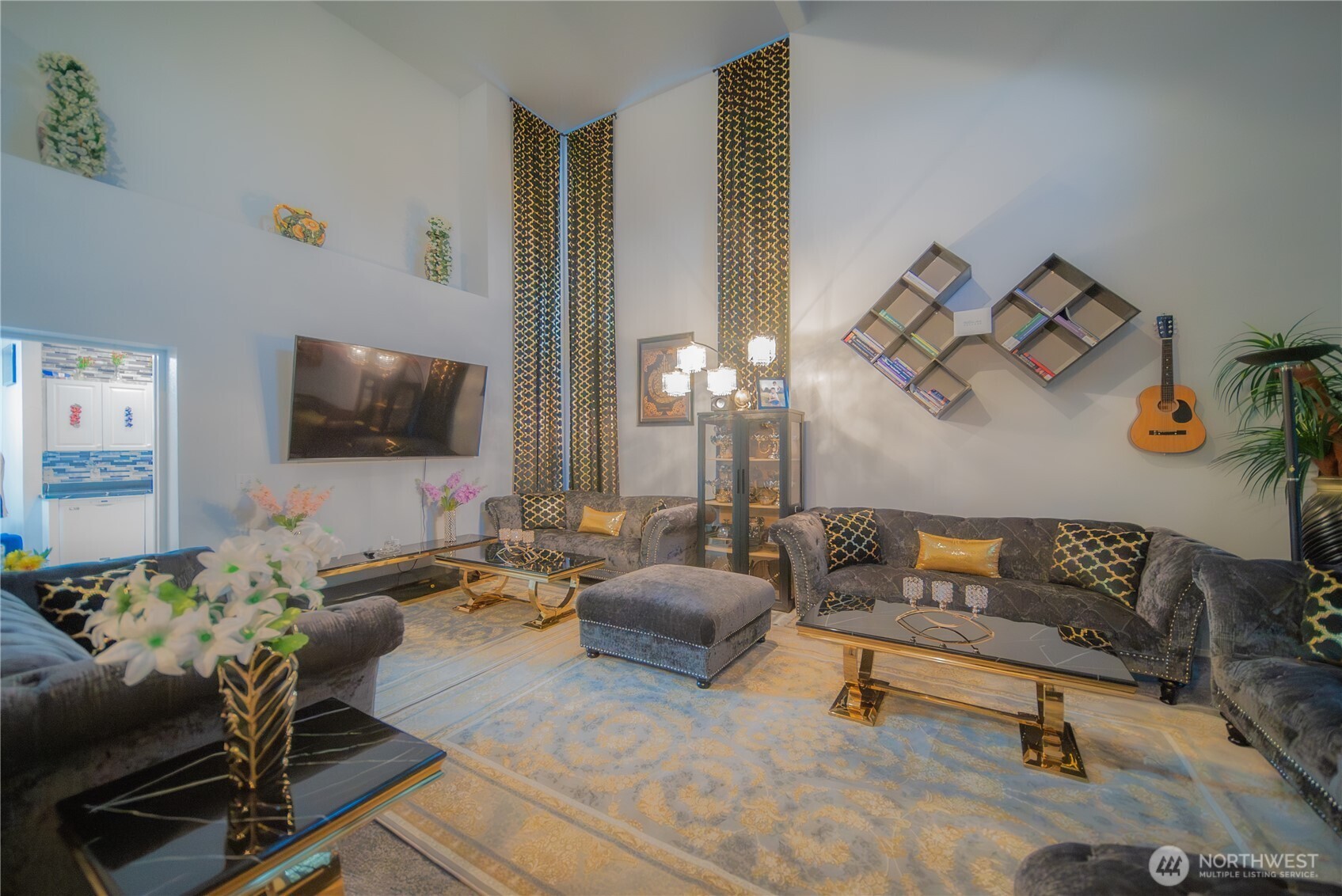 5615 South 233rd Street Kent, WA 98032 - Photo 4 of 24 a living room with furniture and a flat screen tv