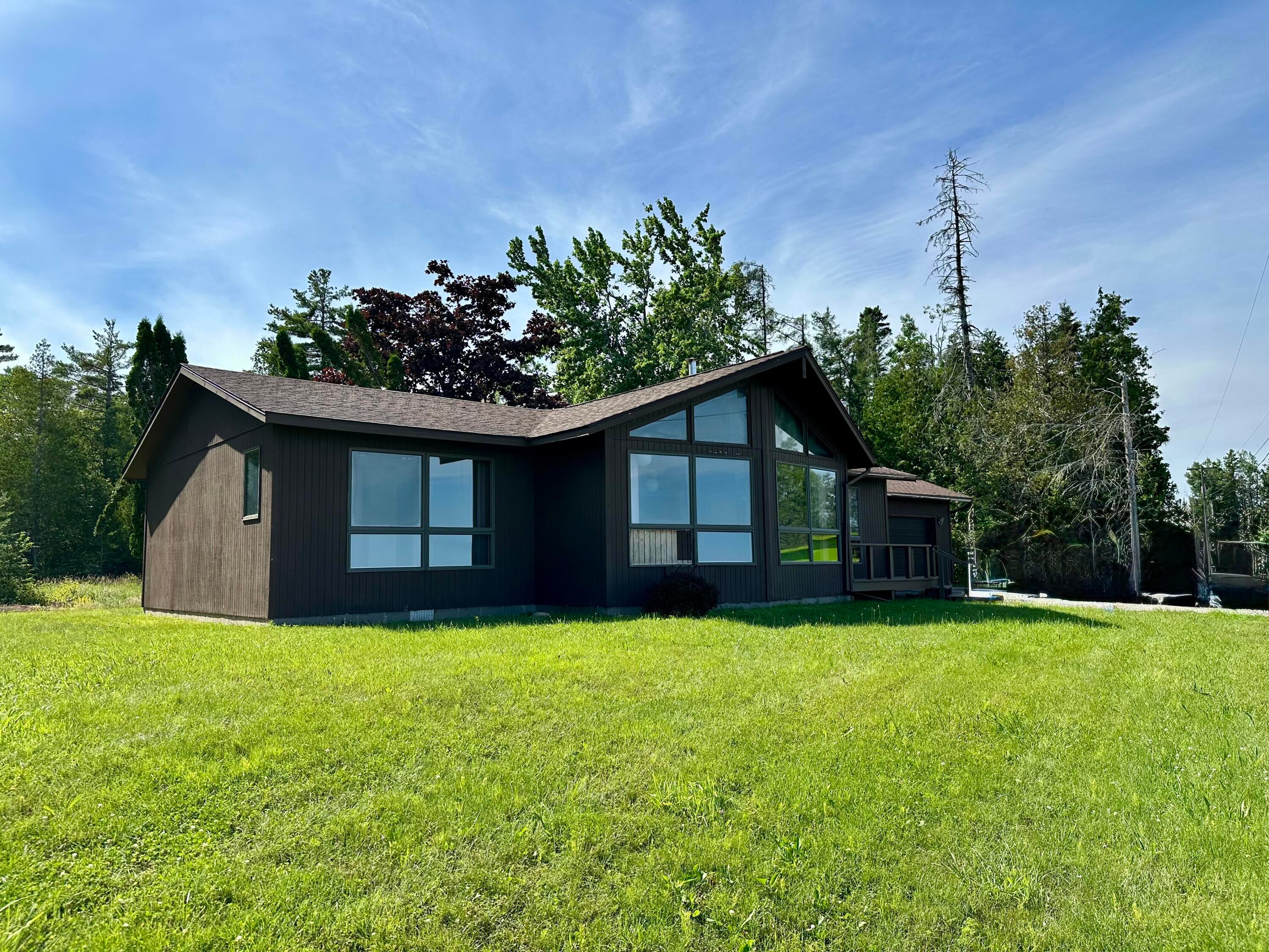 14515 Stoney Pointe Road Cheboygan, MI 49721 - Photo 1 of 25 Road Side