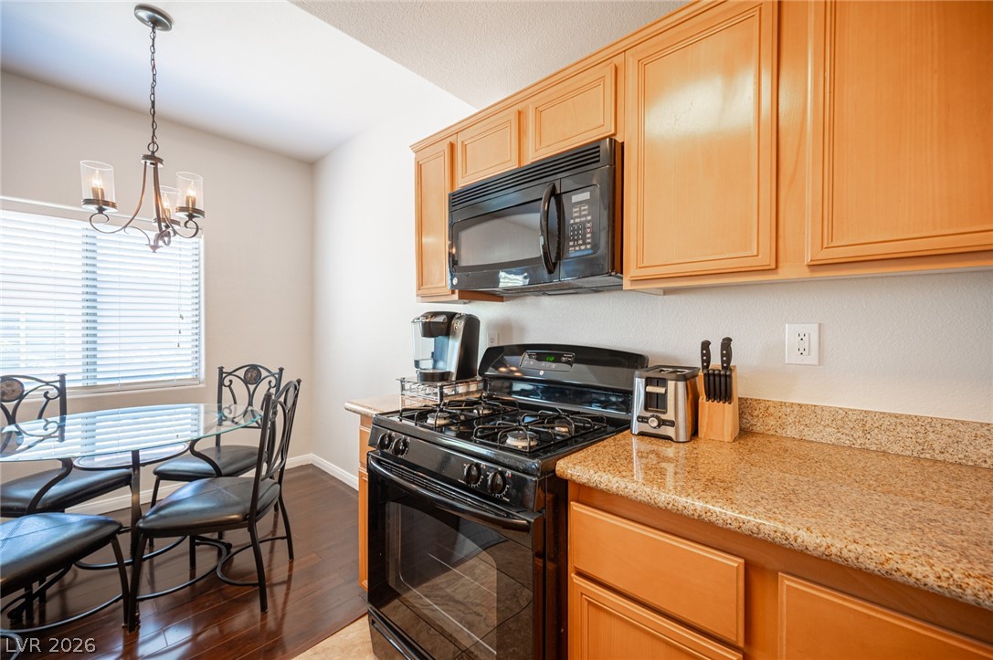 7701 West Robindale Road, Unit 274 Las Vegas, NV 89113 - Photo 15 of 38 This cozy kitchen features sleek appliances and ample counter space for all your culinary needs.