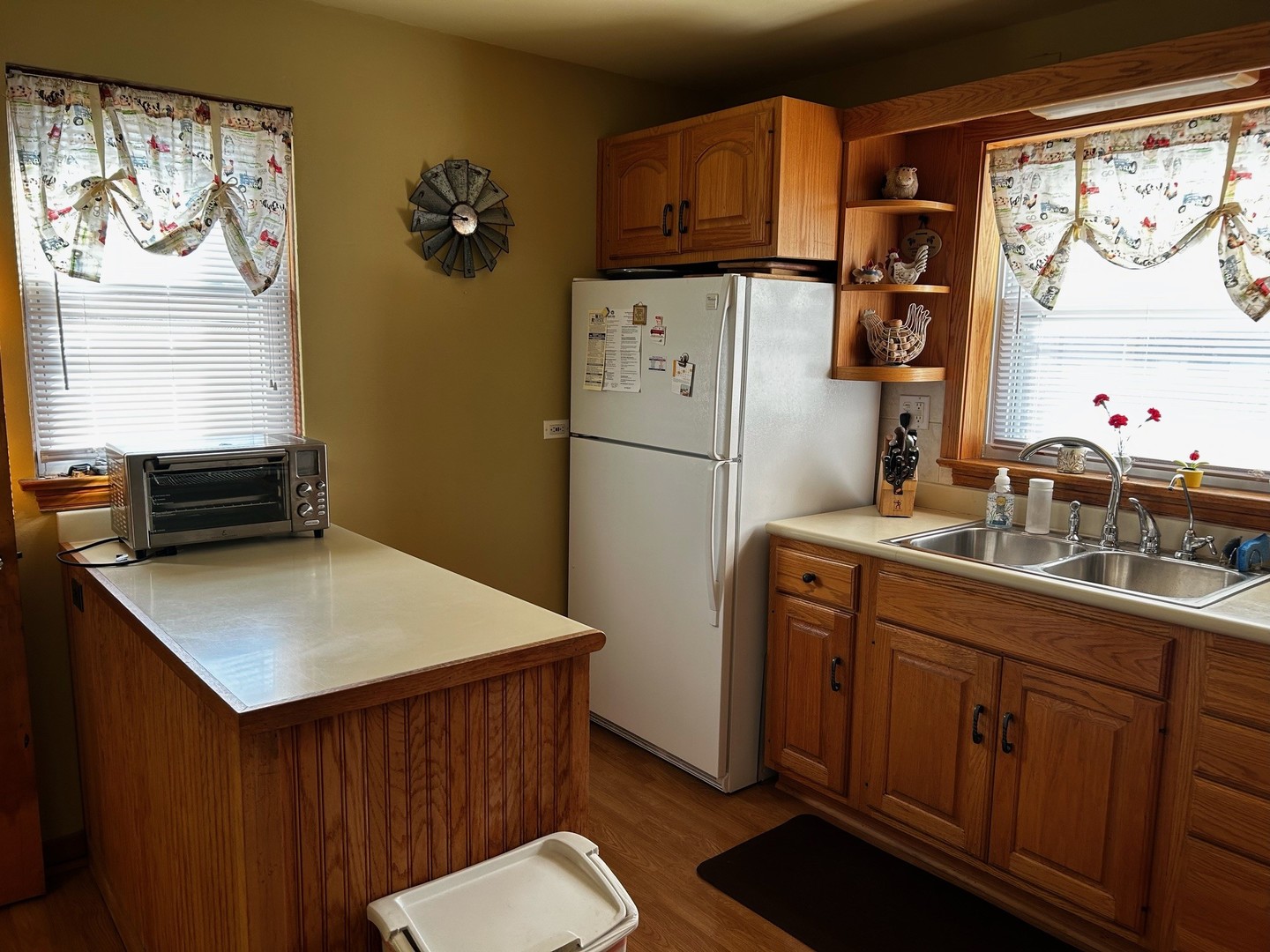 2247 South 15th Avenue North Riverside, IL 60546 - Photo 7 of 18 a kitchen with a refrigerator a sink dishwasher and cabinets