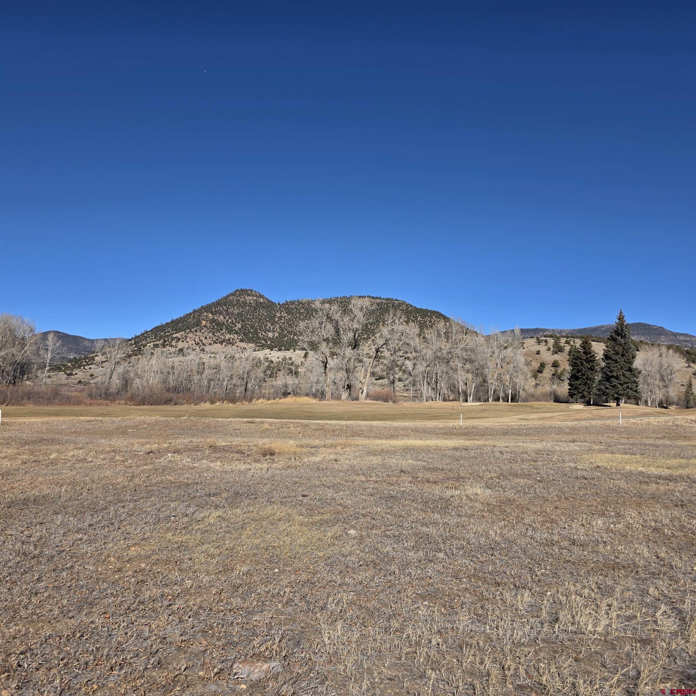 59 West Riverside Court South Fork, CO 81154 - Photo 4 of 13 a view of an lake and a mountain