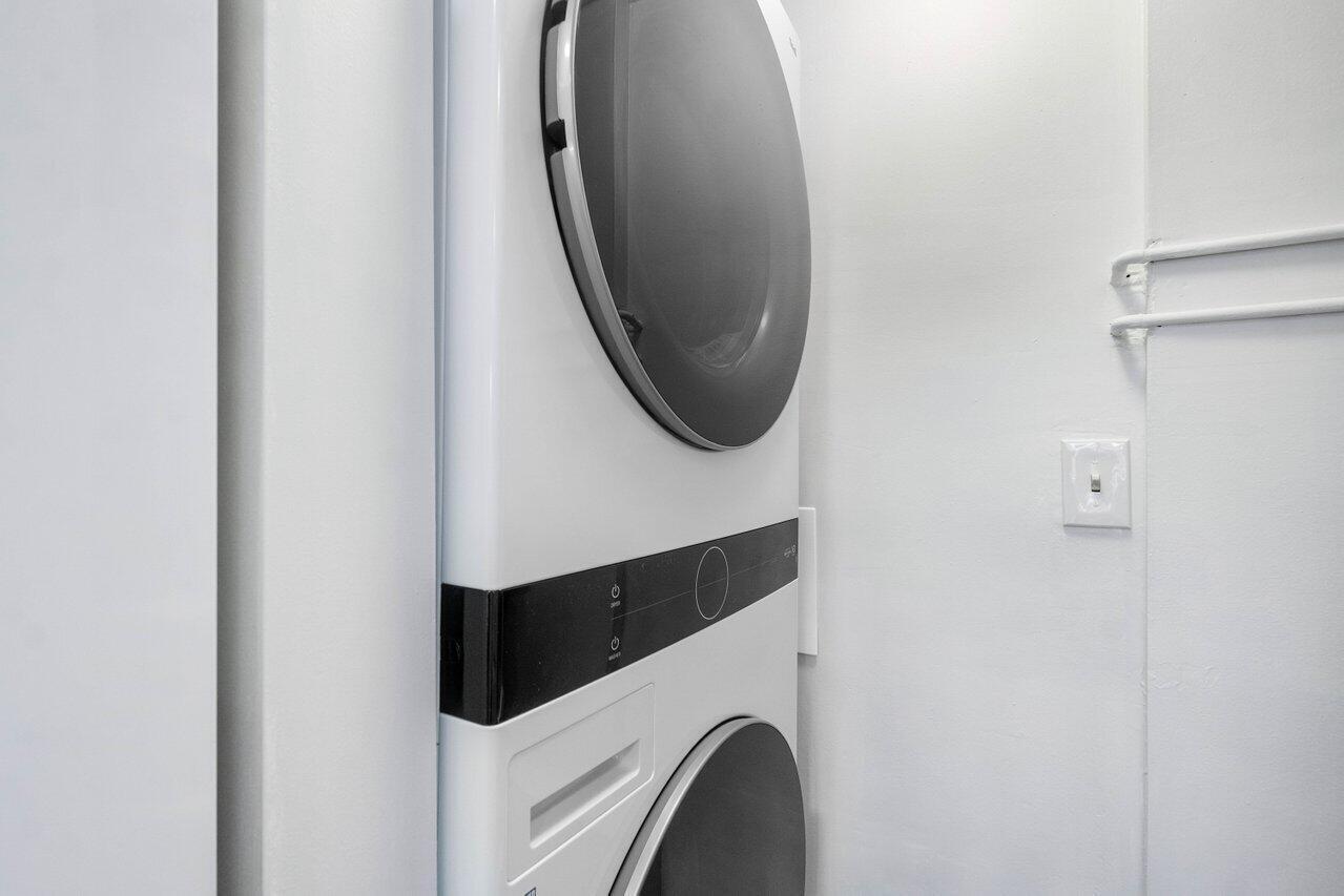 899 Jeffery Street, Unit 3050 Boca Raton, FL 33487 - Photo 16 of 31 a utility room with dryer and washer
