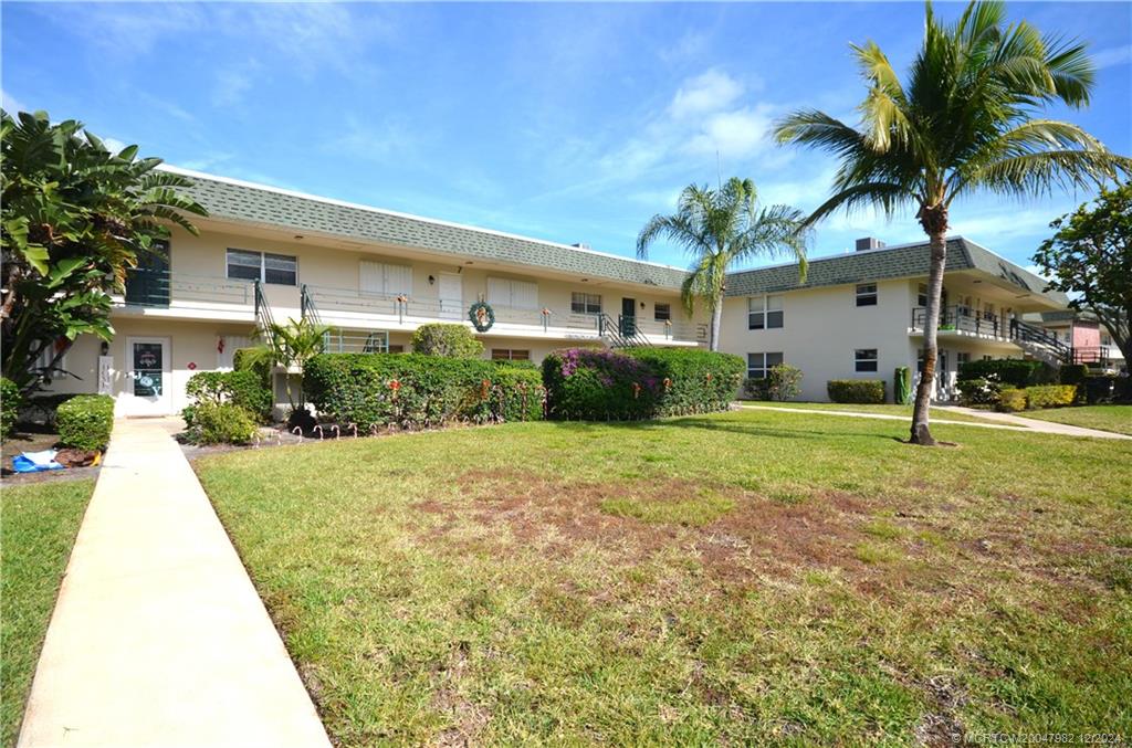 1900 South Kanner Highway, Unit 7205 Stuart, FL 34994 - Photo 22 of 25 a view of a house with a backyard