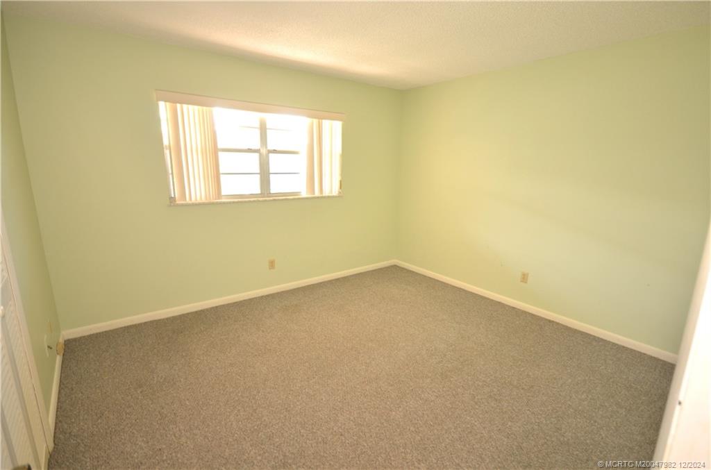 1900 South Kanner Highway, Unit 7205 Stuart, FL 34994 - Photo 9 of 25 an empty room with a window