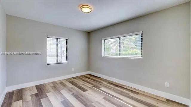 a view of a room with a window